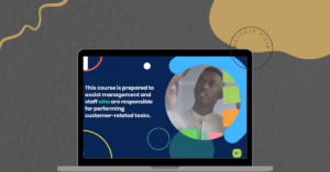 A laptop with an image of a man writing in a whiteboard